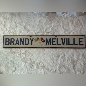 Original Brandy Melville wooden store sign with flags